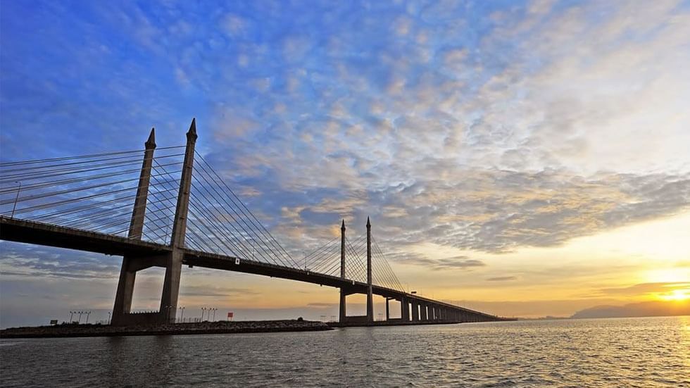 Distant view of Penang Bridge at sunrise near Sunway Hotel Seberang Jaya