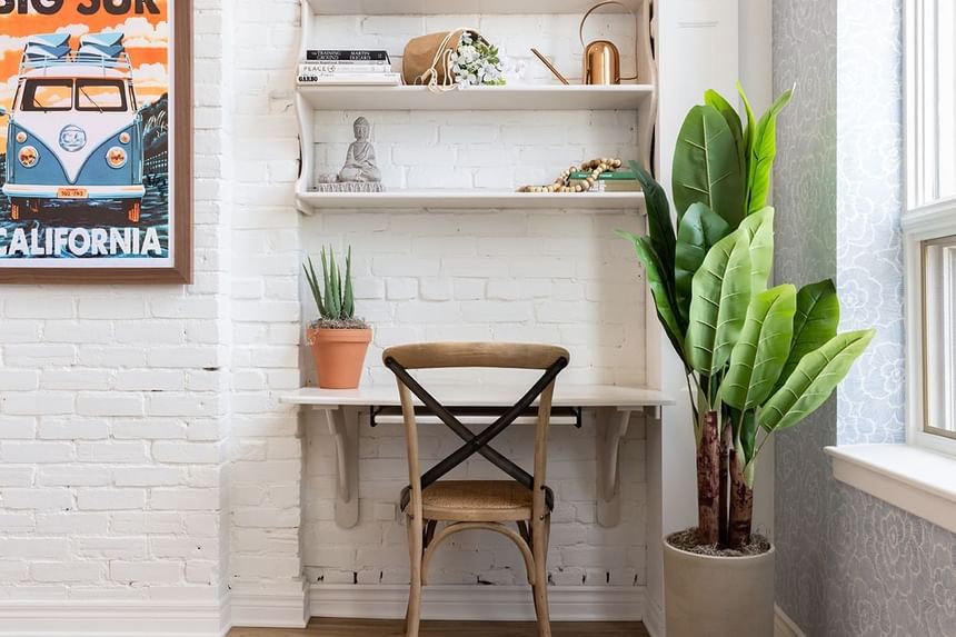 Workspace with shelf & plants in Superior Loft at Retro Suites Hotel