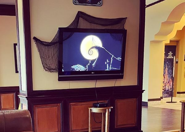 Halloween movies showing in lobby area of Lake Buena Vista Resort Village & Spa