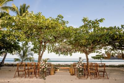 A wedding ceremony with a beach view at Punta Islita Hotel