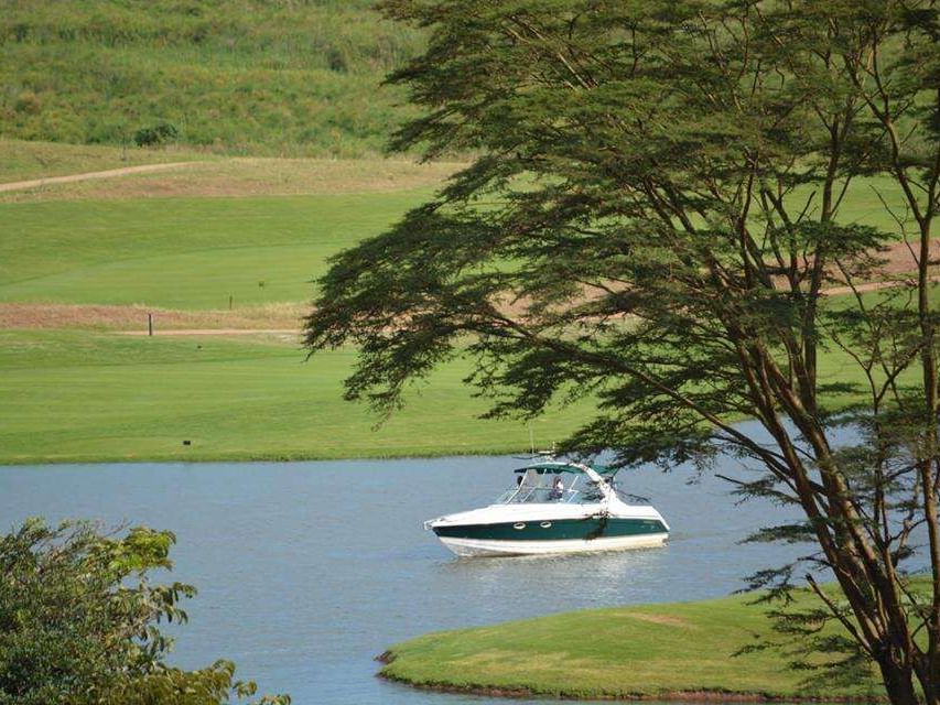 Boat at Paradise island near Lake Victoria Serena Resort & Spa