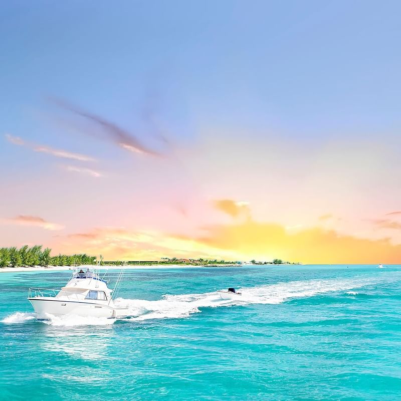 A boat sailing on the Bahamas Beach near Warwick Paradise Island Bahamas
