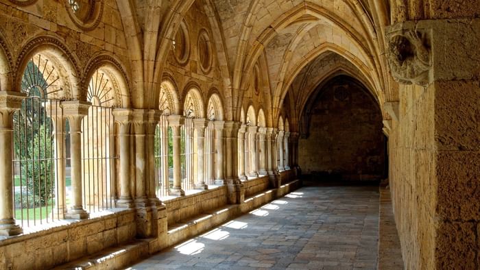 A Hallway of The Abbey of Fontenay near The Originals Hotels
