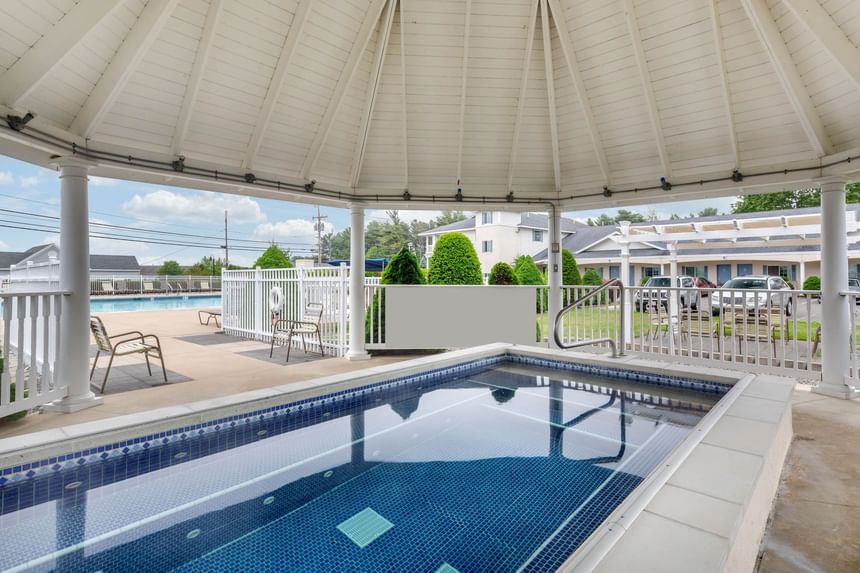 Outdoor pool area overlooking the sea at Ogunquit Collection