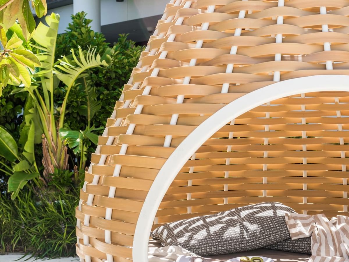 Close-up of a relaxing cane chair at Crown Metropol Perth