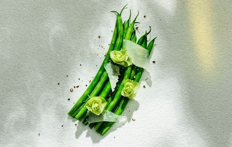 Top view of Green Beans dish served in Le Marché at The Londoner