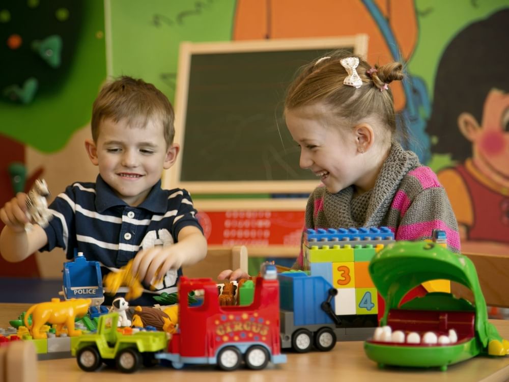 Kids playing with toys in Titan Tikes Kids Club at Kempinski Hotel Cancún