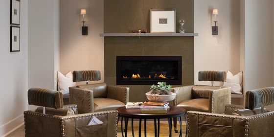 Living room and fireplace in hotel room