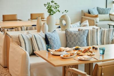 Variety of dishes served on a table in Trattoria@22 restaurant at Eastin Grand Hotel Phayathai