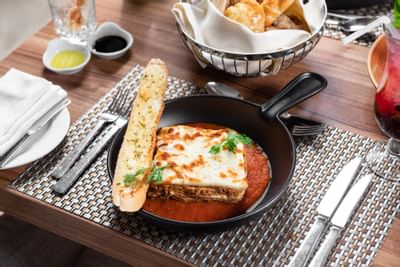 Lasagna dish served at the Seasons Restaurant in Bay La Sun Hotel & Marina