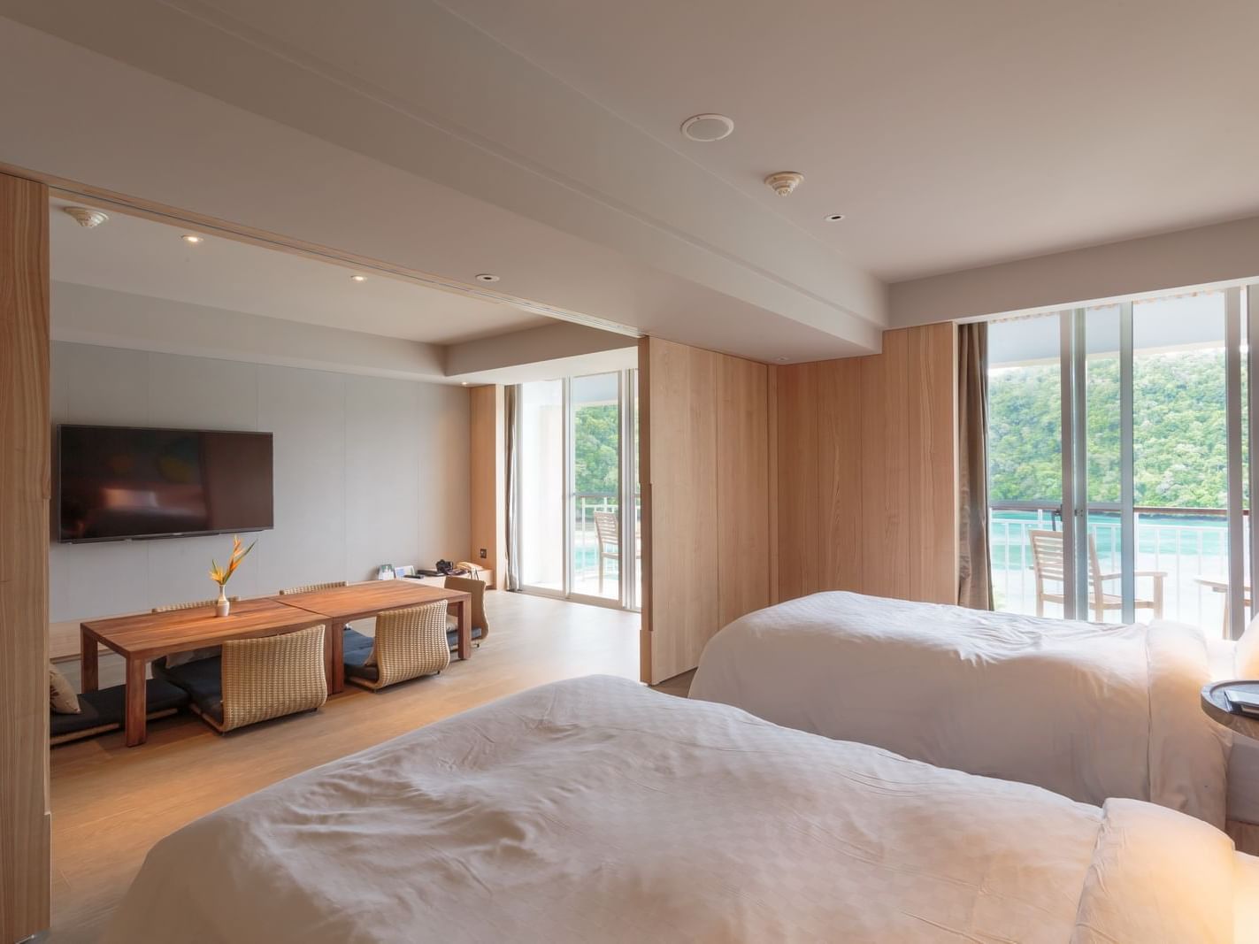 Twin beds in a Corner Suite Room at Palau Royal Resort