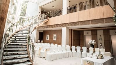 Wedding chair setup next to stairs at Amara Sanctuary Resort