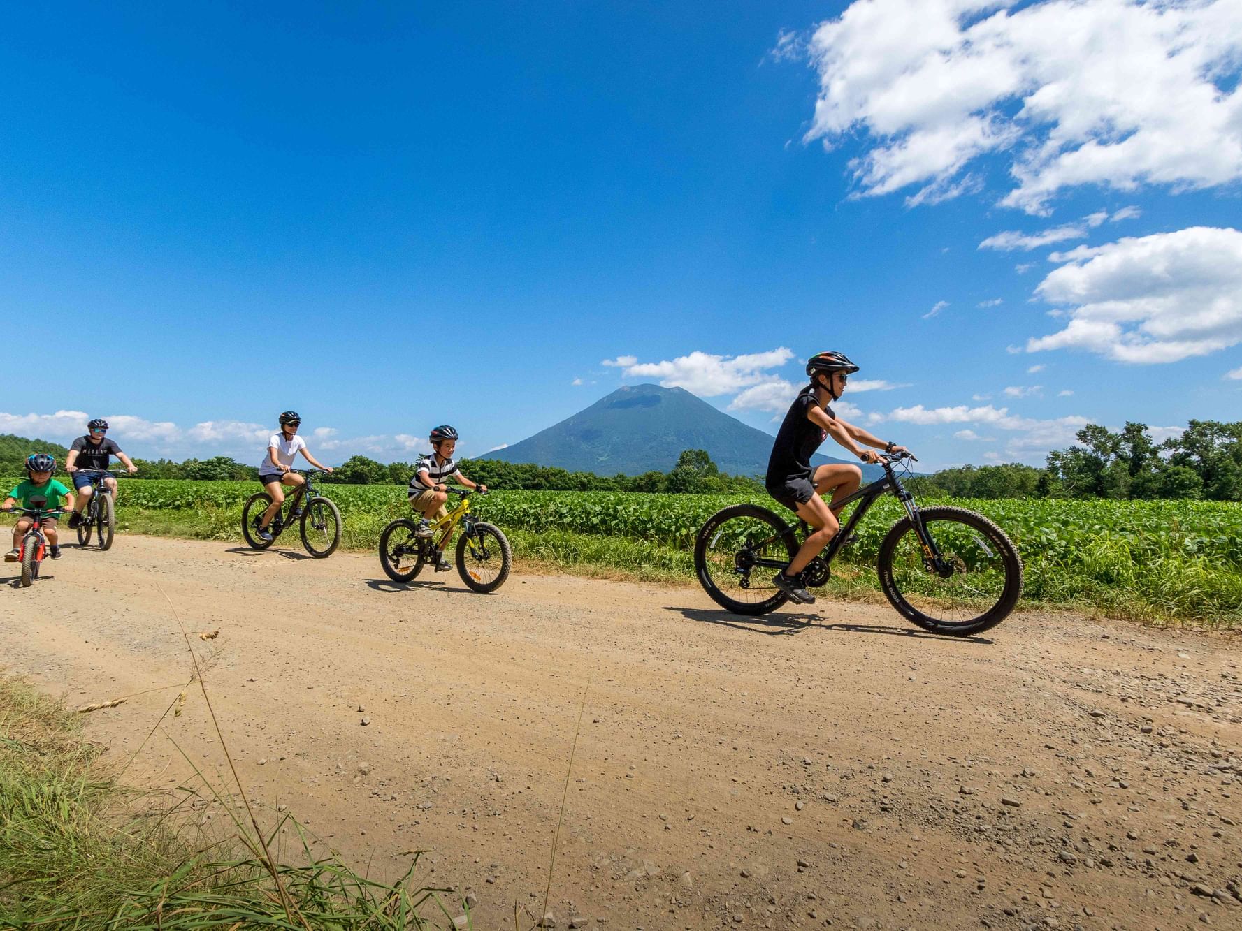 View of Kids Cycling near Chatrium Niseko Japan