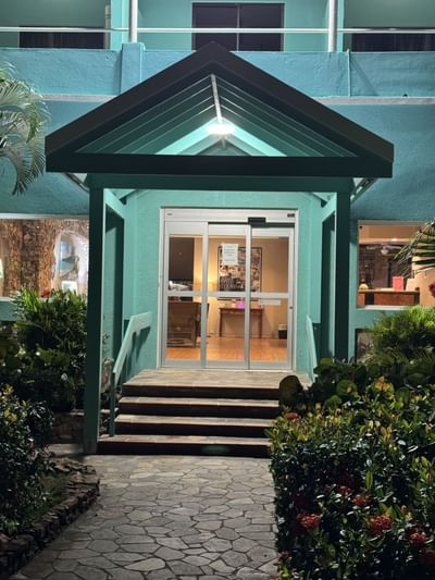 Entrance with glass doors at Lindbergh Bay Hotel, restful nights at a convenient St. Thomas hotel for early morning flights