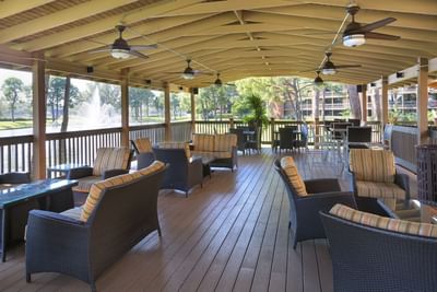 Wooden interior with an outdoor lounge area at Rosen Inn Lake Buena Vista