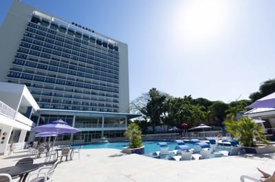 An exterior low-angle view of Jamaica Pegasus Hotel