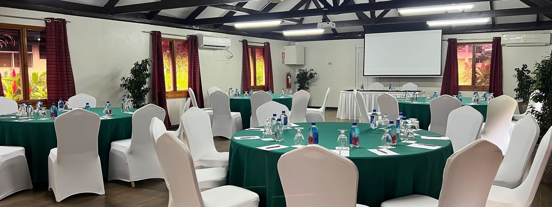Conference Room 2 with round tables and white chairs at Tokatoka Resort - Fiji International Airport in Nadi