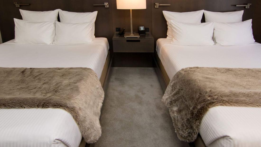 Two beds in redesigned hotel room