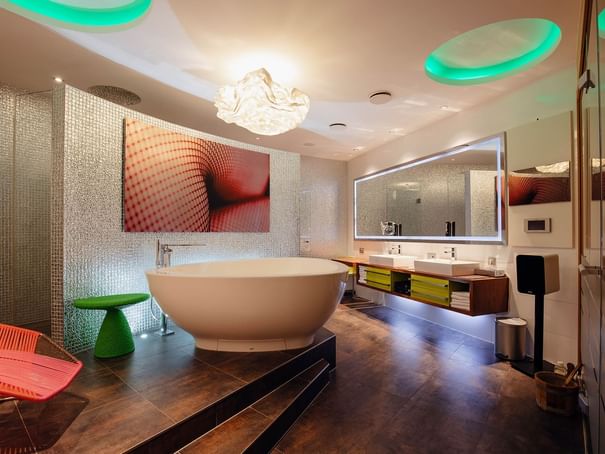 Bathroom with bathtub in Teufel Suite at Hotel Berlin Berlin