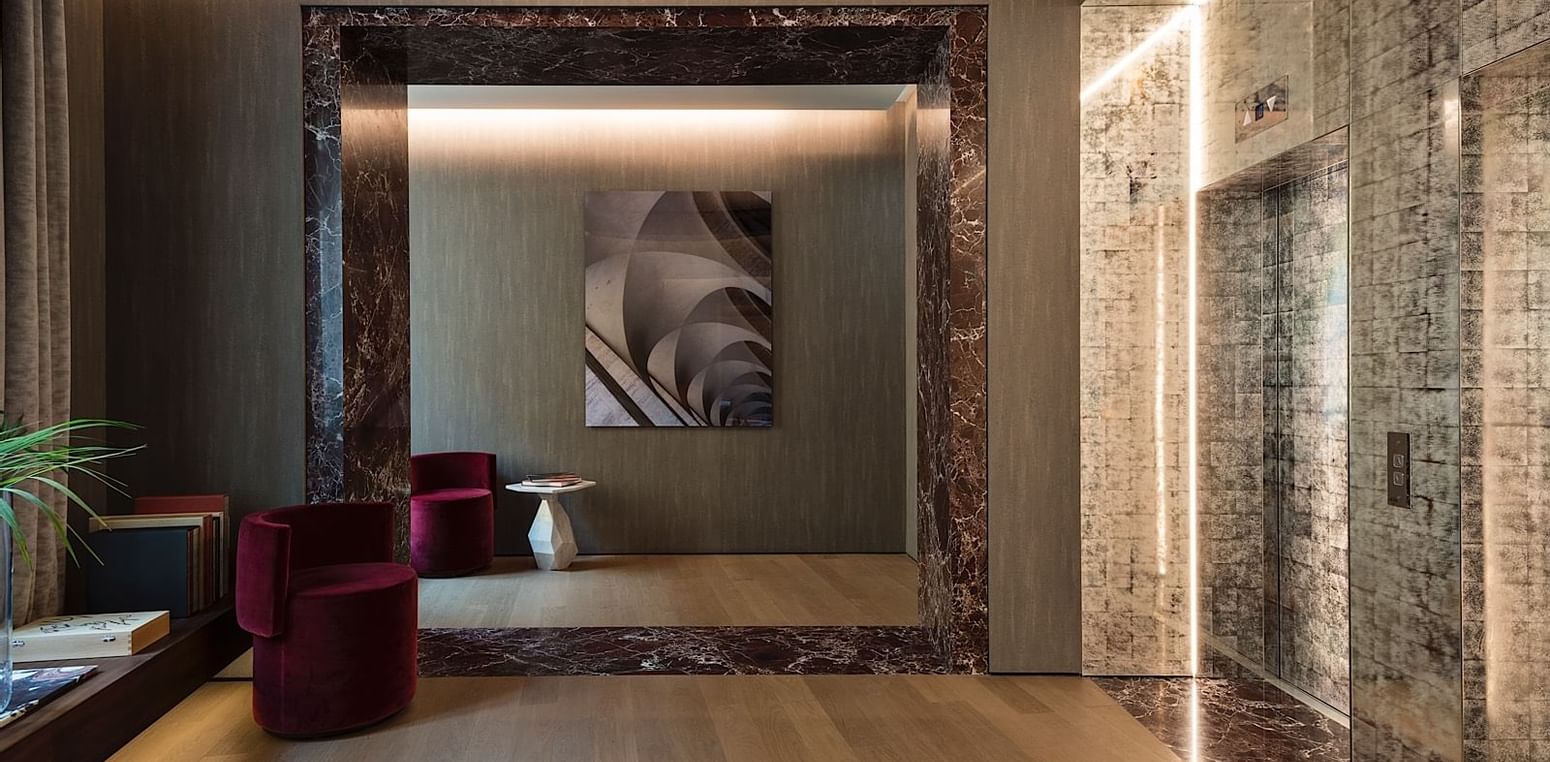 Reception area with elevator at Fendi Private Suites