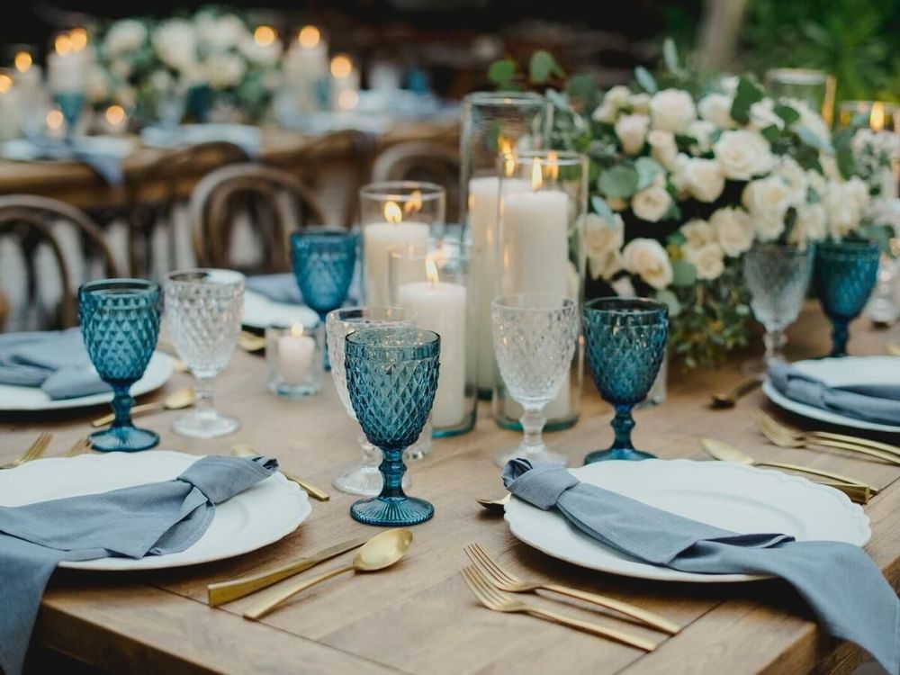 Blue themed wedding table setting at Live Aqua Beach Resort 