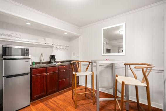 Kitchen area with a wooden interior in Studio Suite Mountain View at Paradise Bay Resort