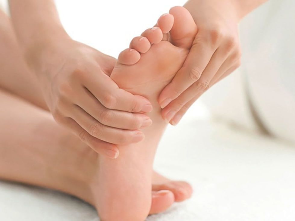 Gentle foot massages given in the spa of Hotel Sumaq