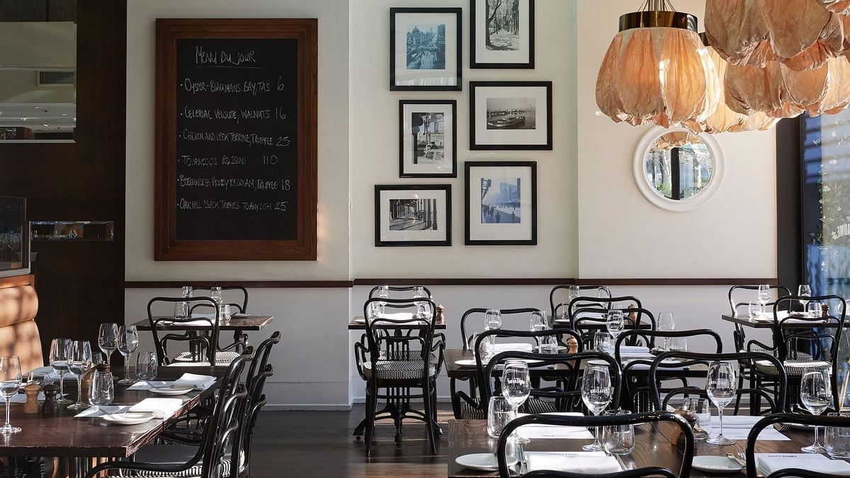 Tables arranged in Bistro Guillaume at Crown Hotels