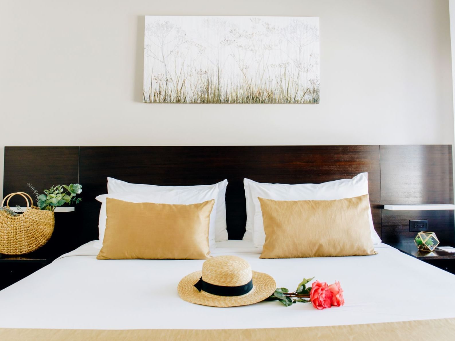 Interior of a room with a king bed at Casa Boutique Hotel