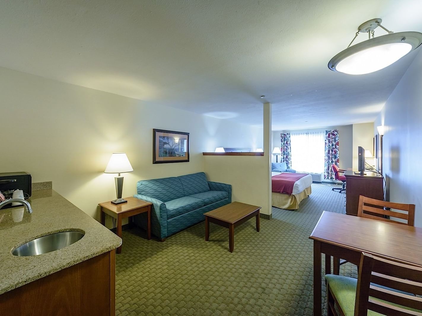 Living Area in Mid Level King Suite at Triple Play Resort Hotel