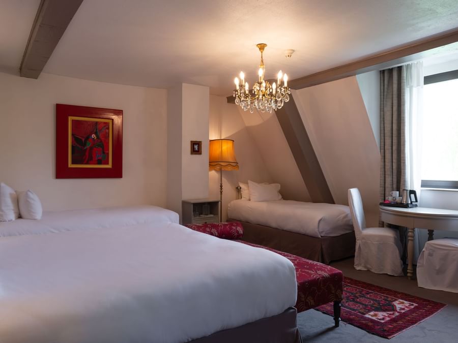 Chambre quadruple confort de l’Hôtel Domaine de Beaupré The Originals Relais