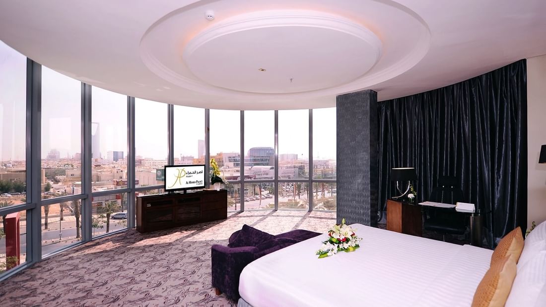 TV facing the bed in Panoramic Suite at Al Hamra Palace by Warwick Riyadhd