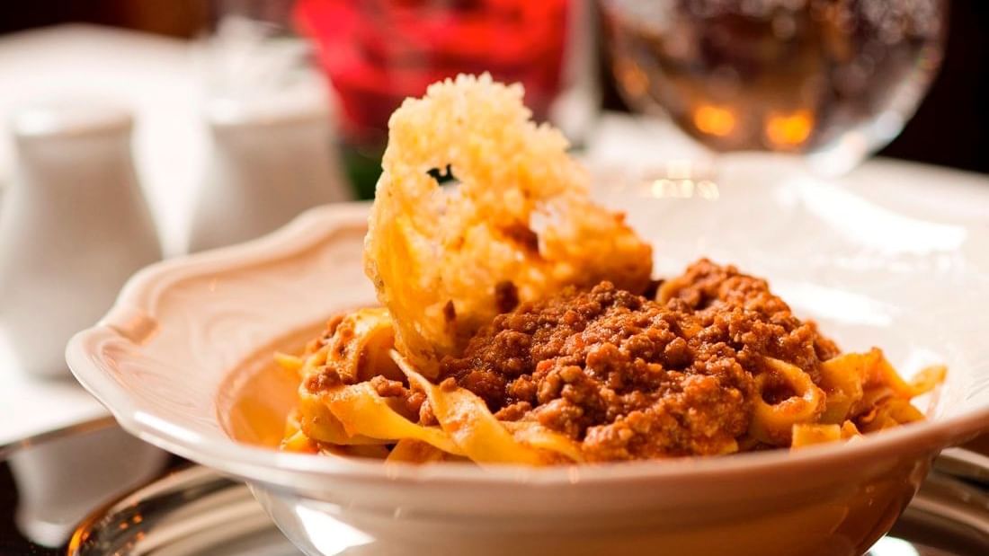 Close-up pasta dish served in Carisma Restaurant at Warwick Doha
