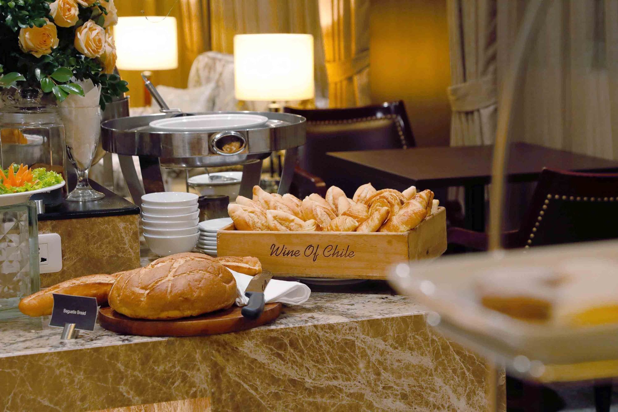 Elegant buffet setup with bread & warm lights at Sunway Hotel Hanoi