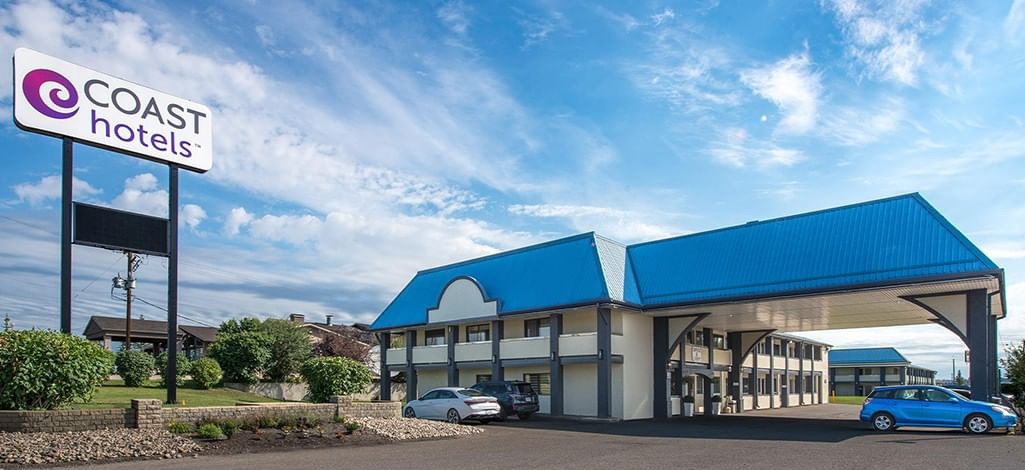 Coast Red Deer Hotel exterior with signage