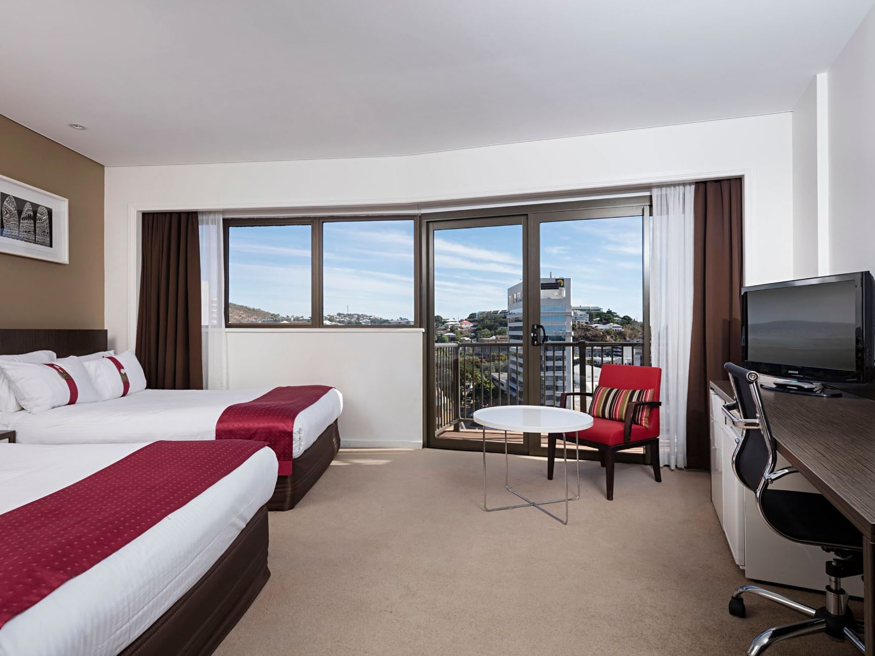 Two comfy beds & work desk with TV in Standard Twin at Hotel Grand Chancellor Townsville