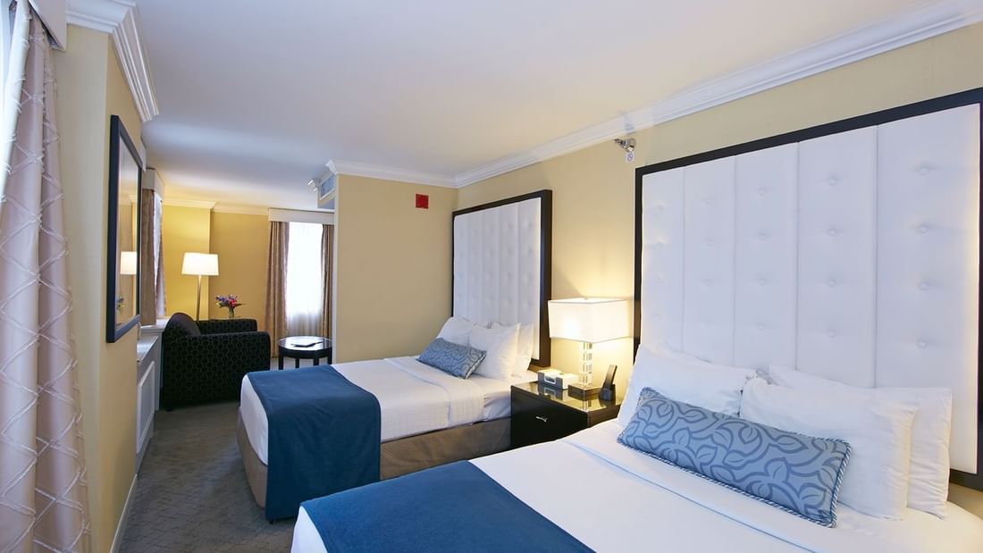 Beds in Premium Suite Two Queen Room at Warwick Allerton - Chicago