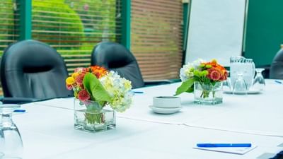 Glass-walled Yaletown Rooms set for a conference at Rosedale on Robson, one of the top meeting rooms in Vancouver, BC