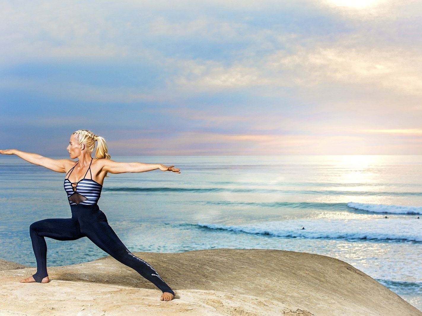 Yoga coach posing at Pullman Bunker Bay Resort