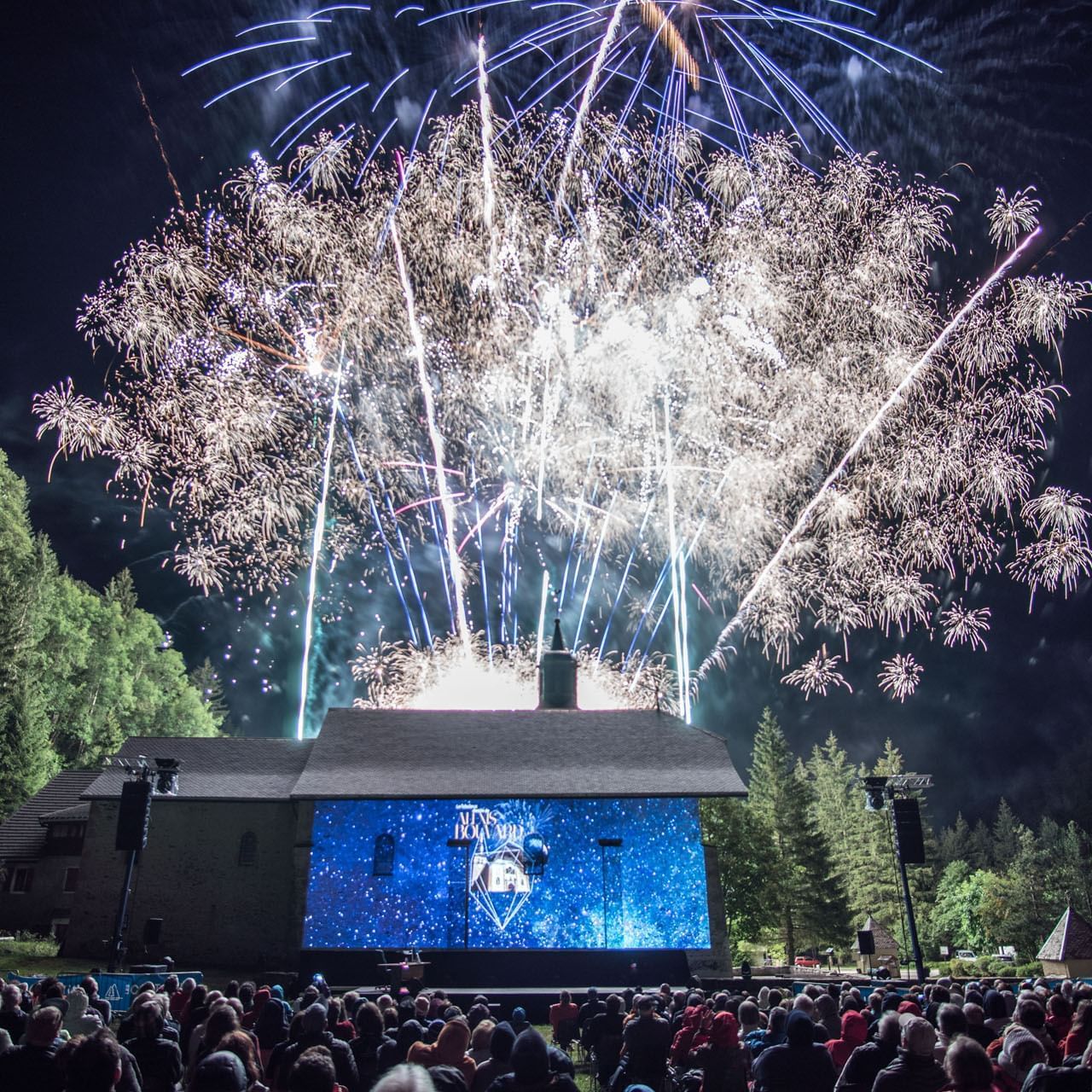 Fireworks in the sky at a musical show near Originals Hotels