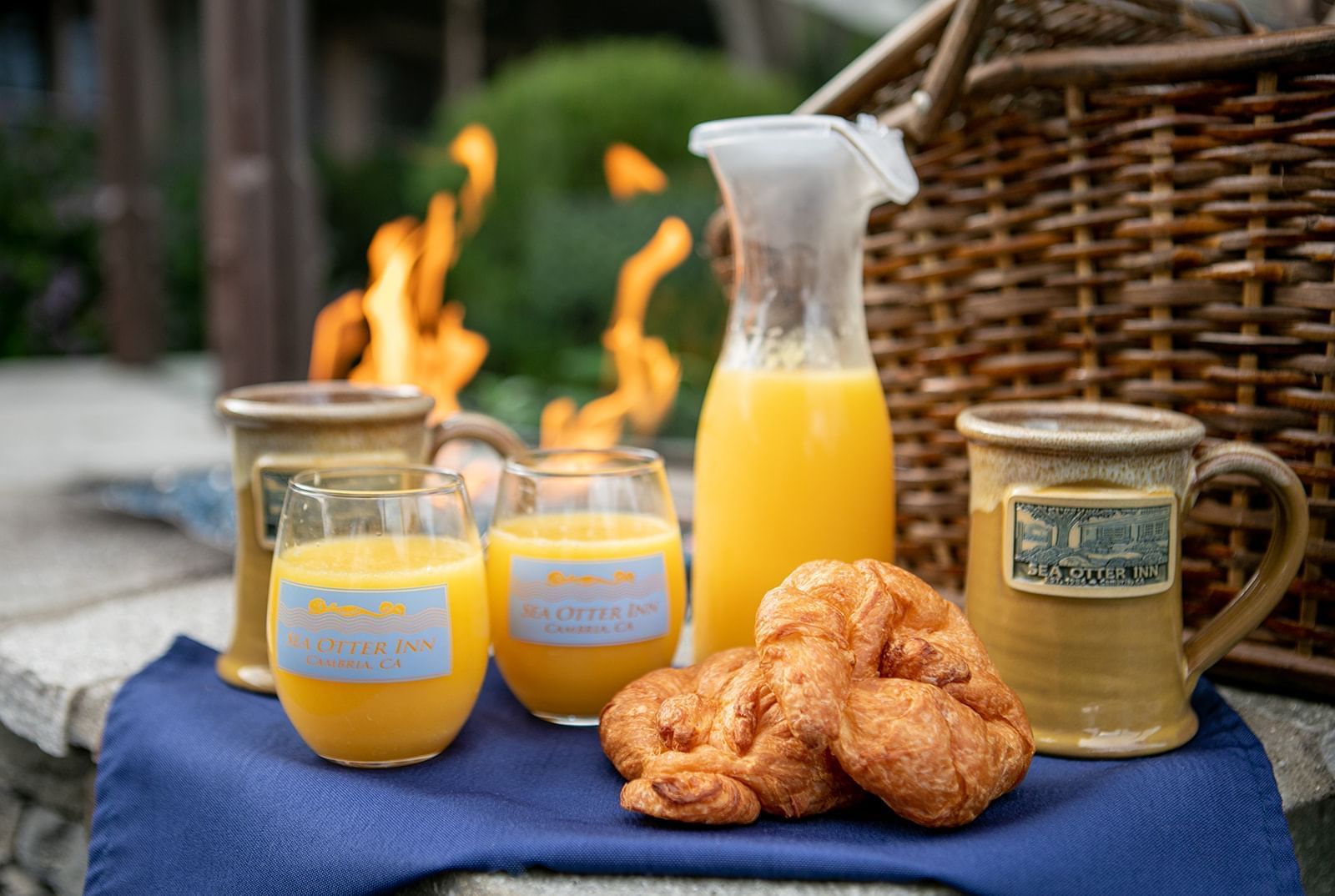 a breakfast spread on an outdoor table