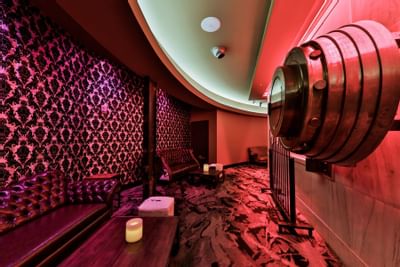 Luxurious seating within the Vault, a premium bar and speakeasy