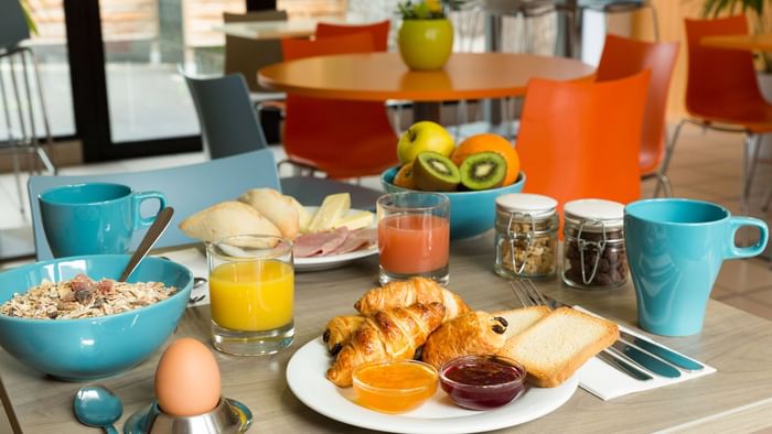 A table with food at Hotel Clermont-Ferrand South Aubiere