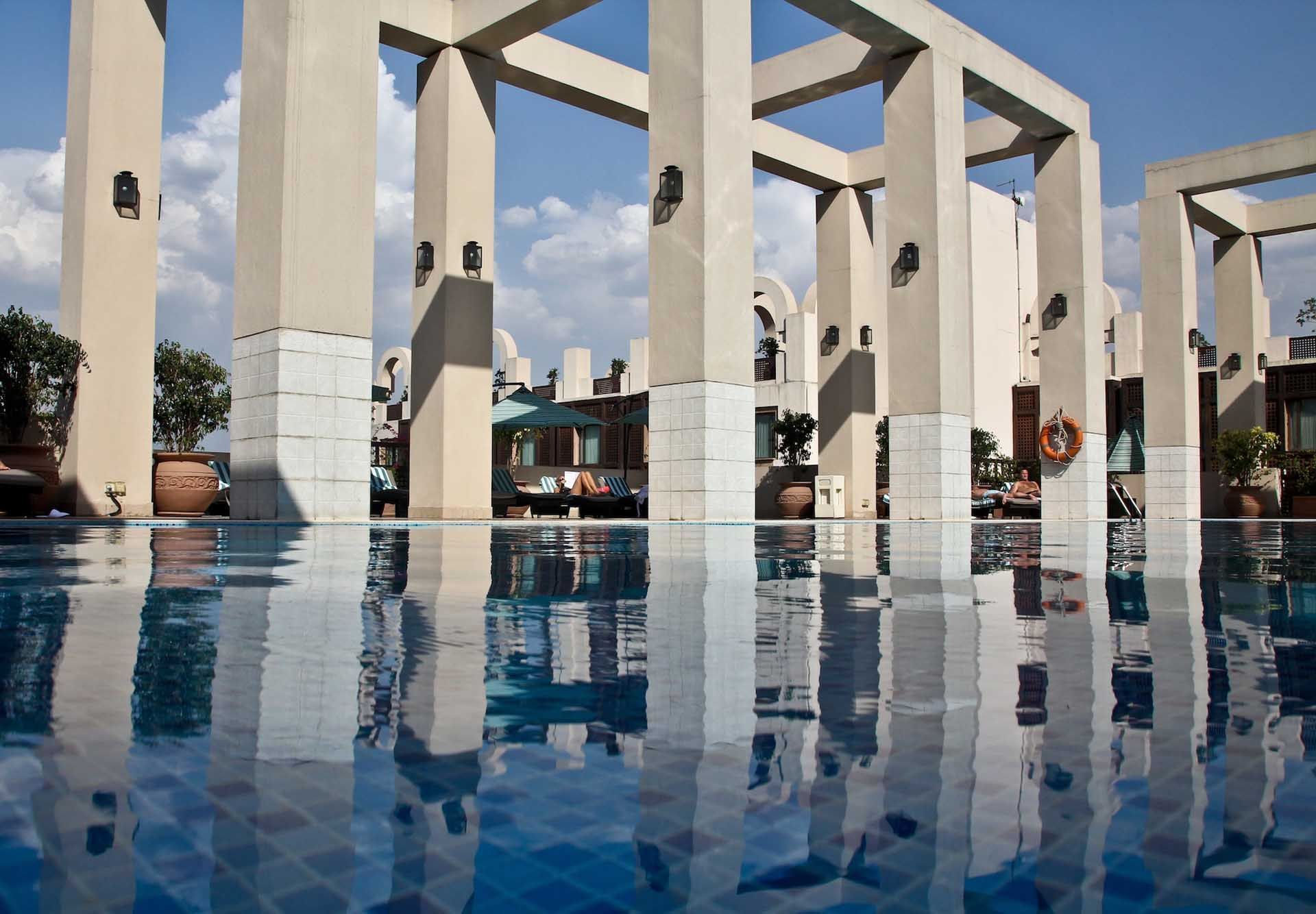Pool and modern concrete columns at The Islamabad Serena Hotel