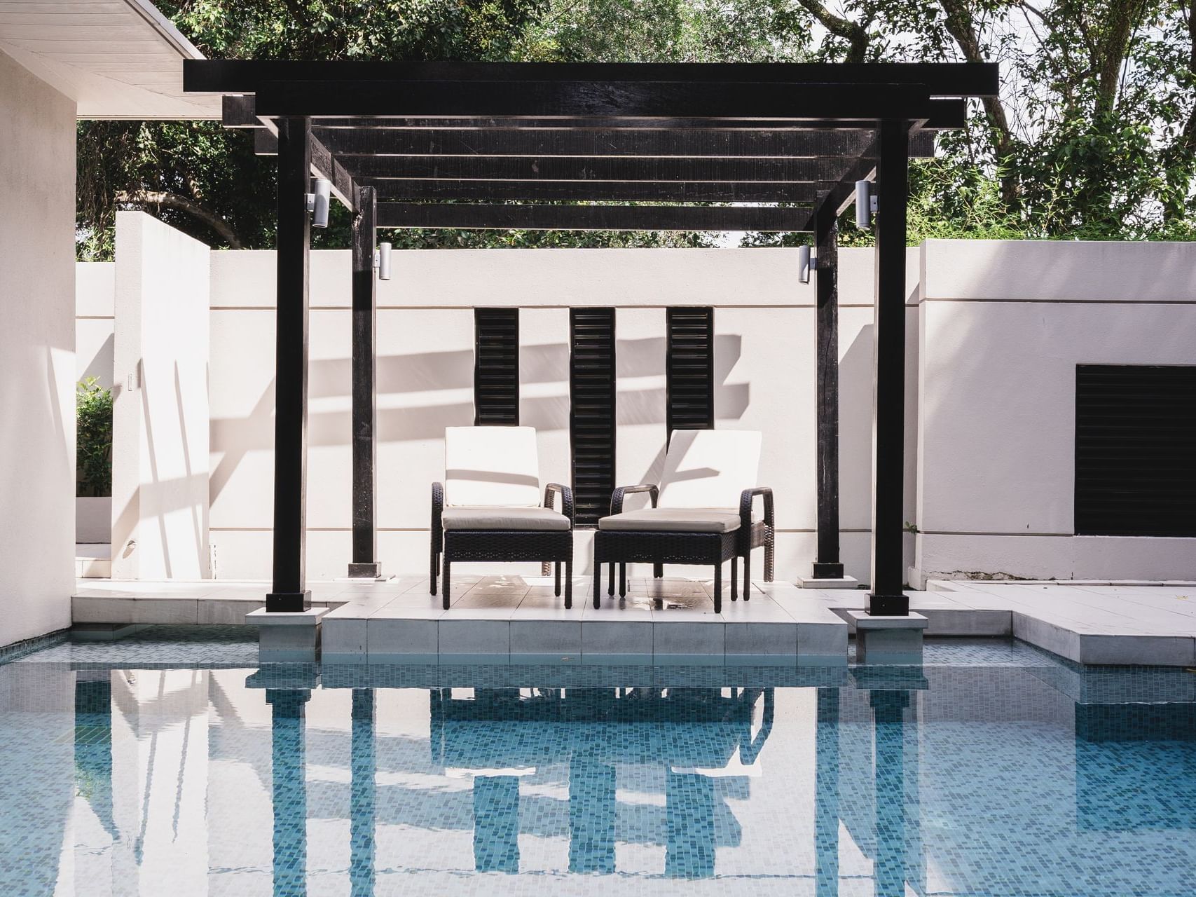 Sunbeds by the pool of 1-Bedroom Villa at Amara Sanctuary Hotel