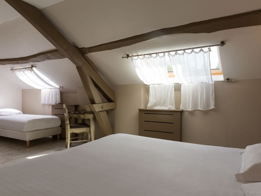 Interior of the Standard room at Hotel Les Poemes de Chartres