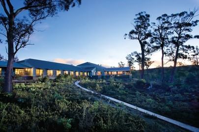 Exterior view of the Cradle Mountain Hotel & evening sky near Freycinet Lodge