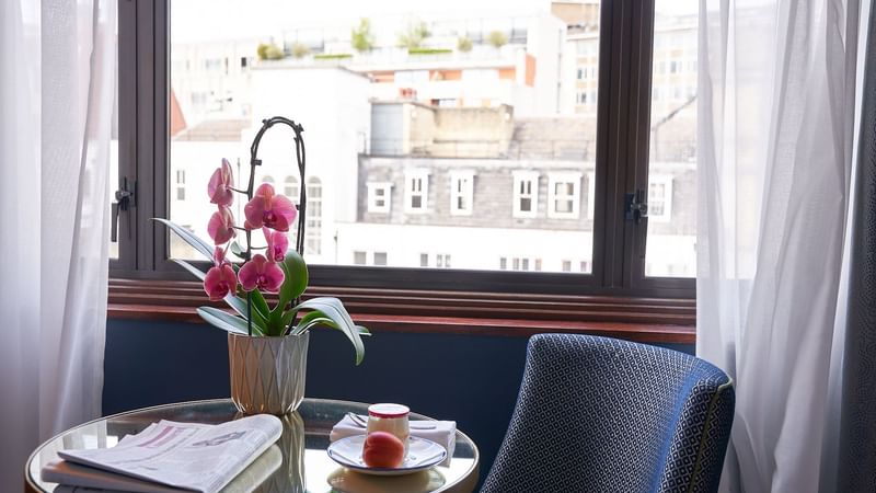 Snack & flowers served by the window in Classic Room at The Capital Hotel London