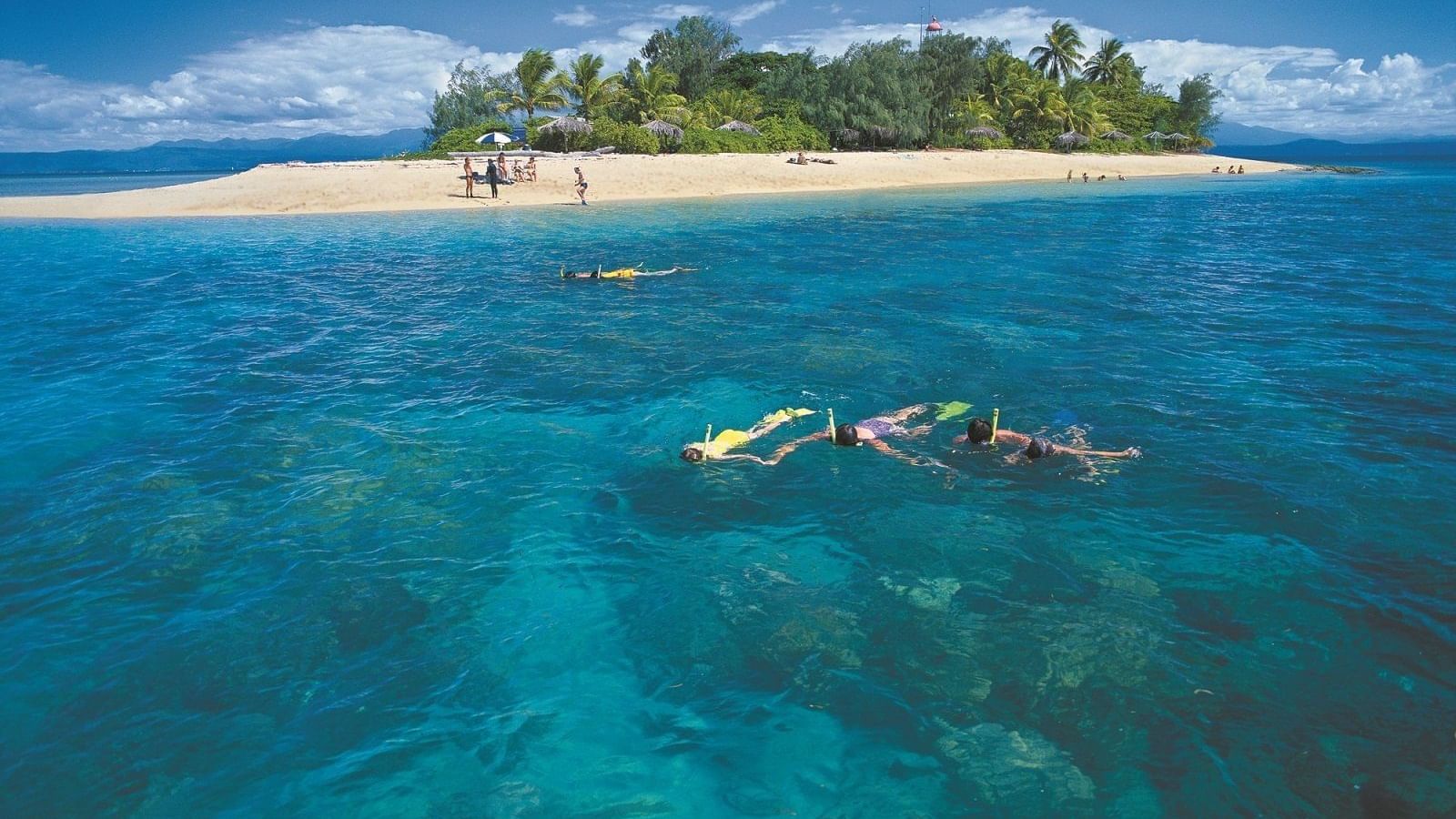 Distant view of Low Isles with ocean near Pullman Port Douglas Sea Temple resort & Spa
