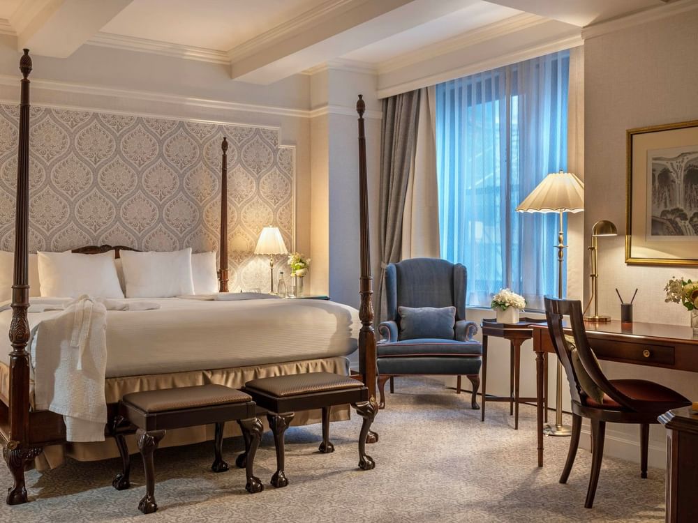 Elegant Suite of the Stars with four-poster bed and office area at Warwick New York